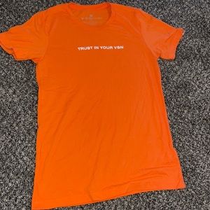 Orange T-shirt unisex. Soft and comfortable “trust in your vsn”